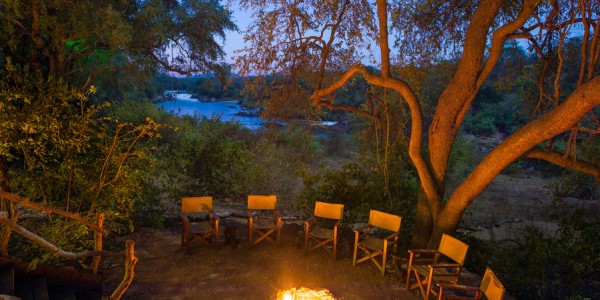Malawi - Majete Wildlife Reserve - Mkulumadzi Cottage - Campfire (credit Robin Pope Safaris)